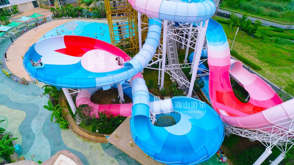 双重风暴，极致竞速——星际盘旋+巨浪翻滚组合引爆水乐园刺激体验